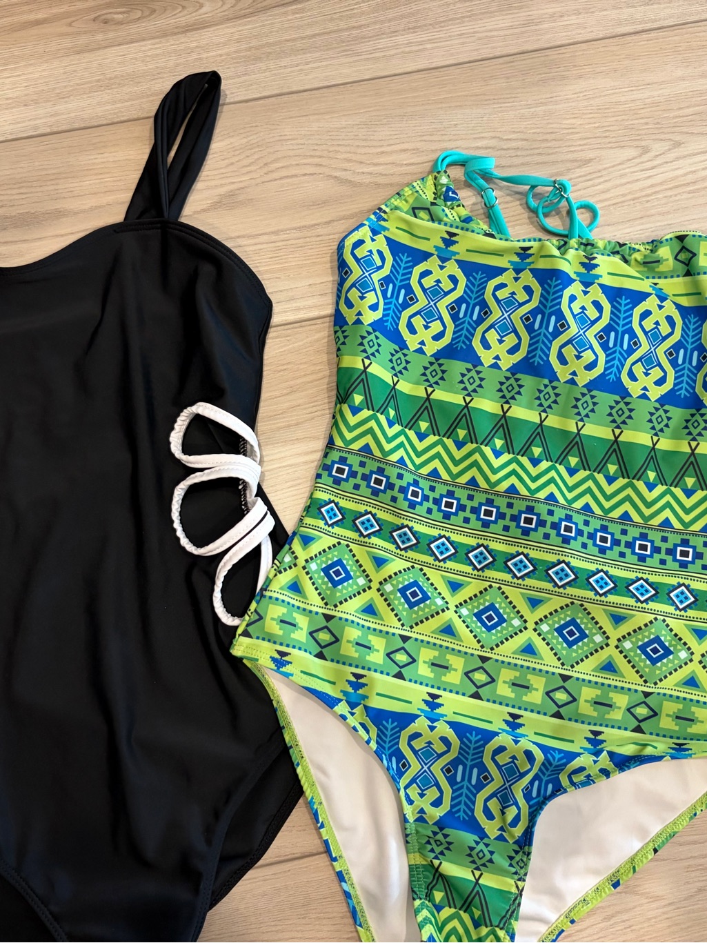 Black One-Piece Swimsuit & Lime Blue Patterned One-Piece Swimsuit